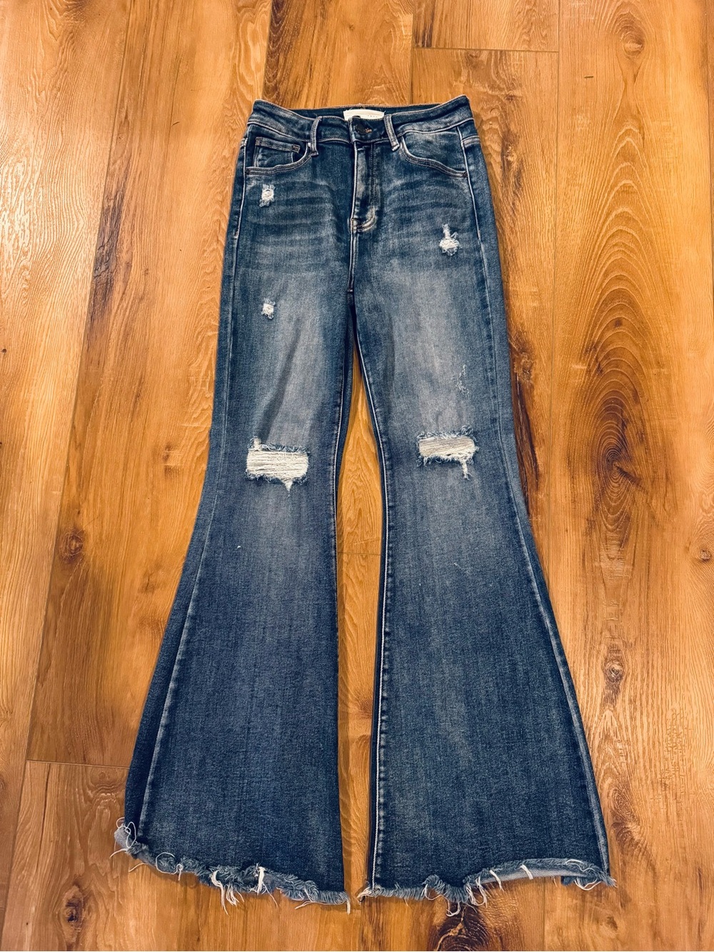 Distressed High-Rise Flare Jeans in Dark Blue